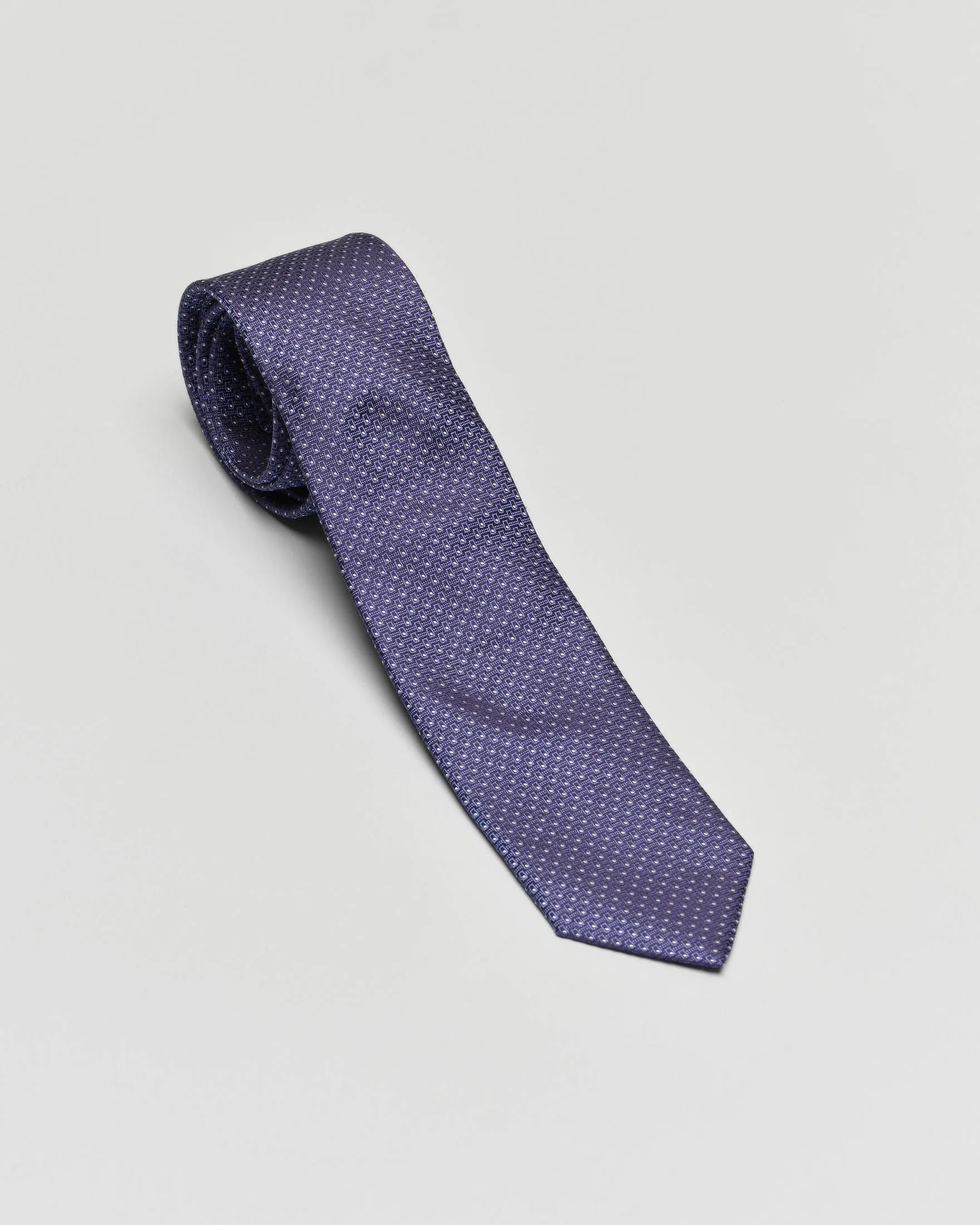 Cravatta blu indaco micro armatura con fantasia pois bianchi in pura seta