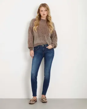 Jeans skinny a vita bassa in cotone stretch lavaggio scuro mirato con schiariture